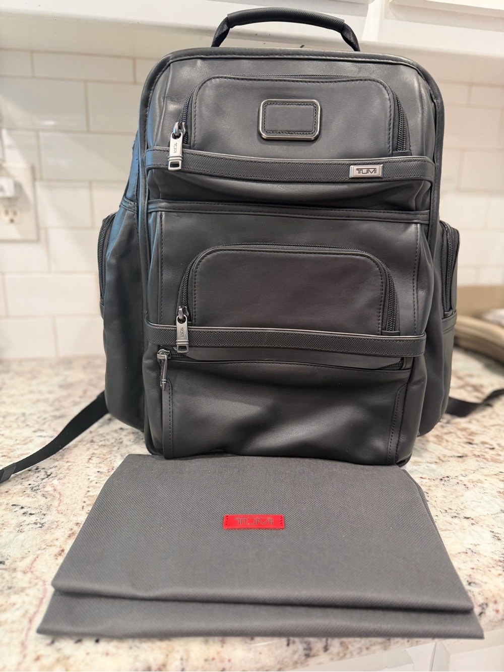 Tumi Black Leather Organizer Backpack with Gray Accents